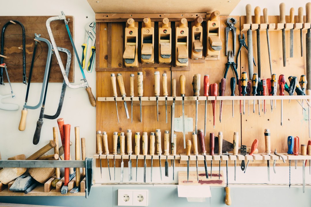 Construction equipment and hand tools organized for a maintenance check