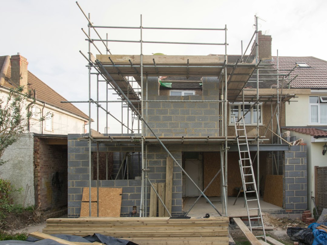 Residential building under construction in Nigeria matching a bill of quantities budget